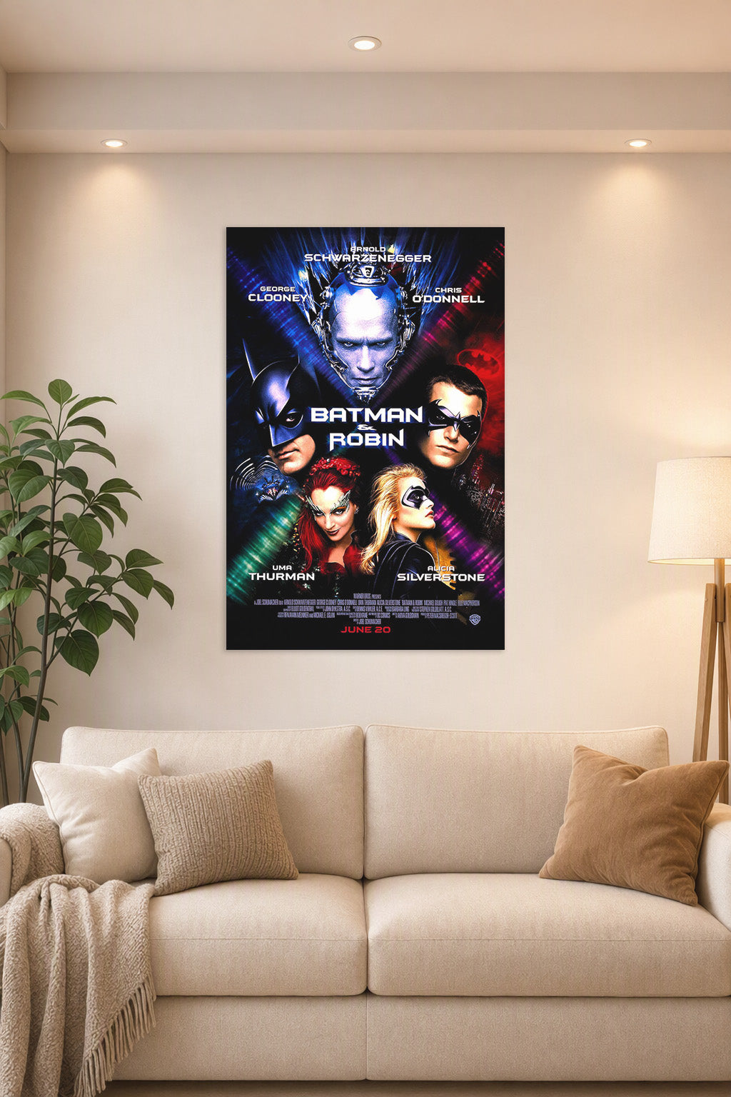 Batman & Robin Movie Poster in a bright living room above a beige sofa.