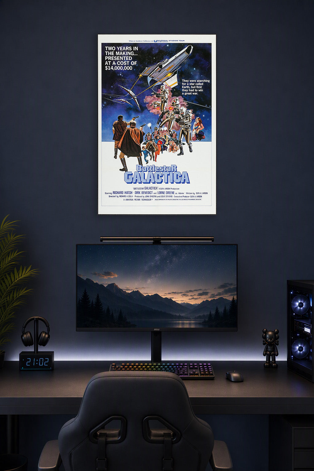Battlestar Galactica Movie Poster in a gaming desk setup above a monitor.