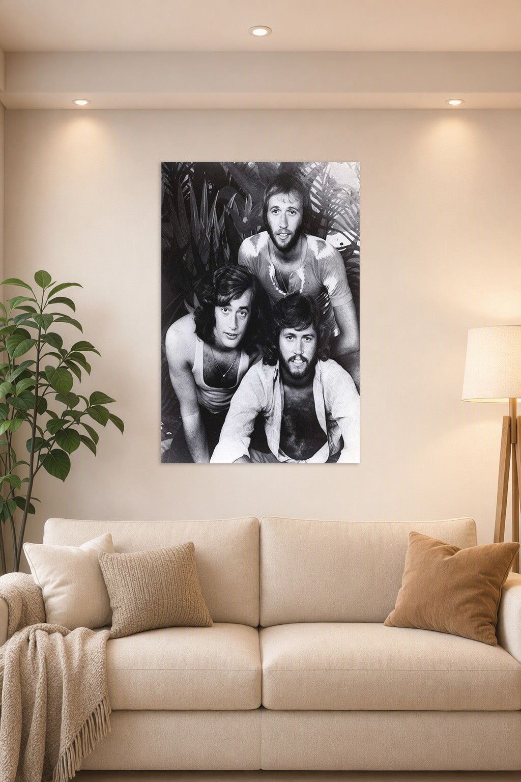 Bee Gees in a bright living room above a beige sofa.