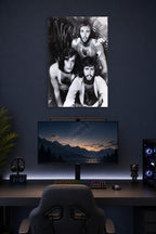 Bee Gees in a gaming desk setup above a monitor.