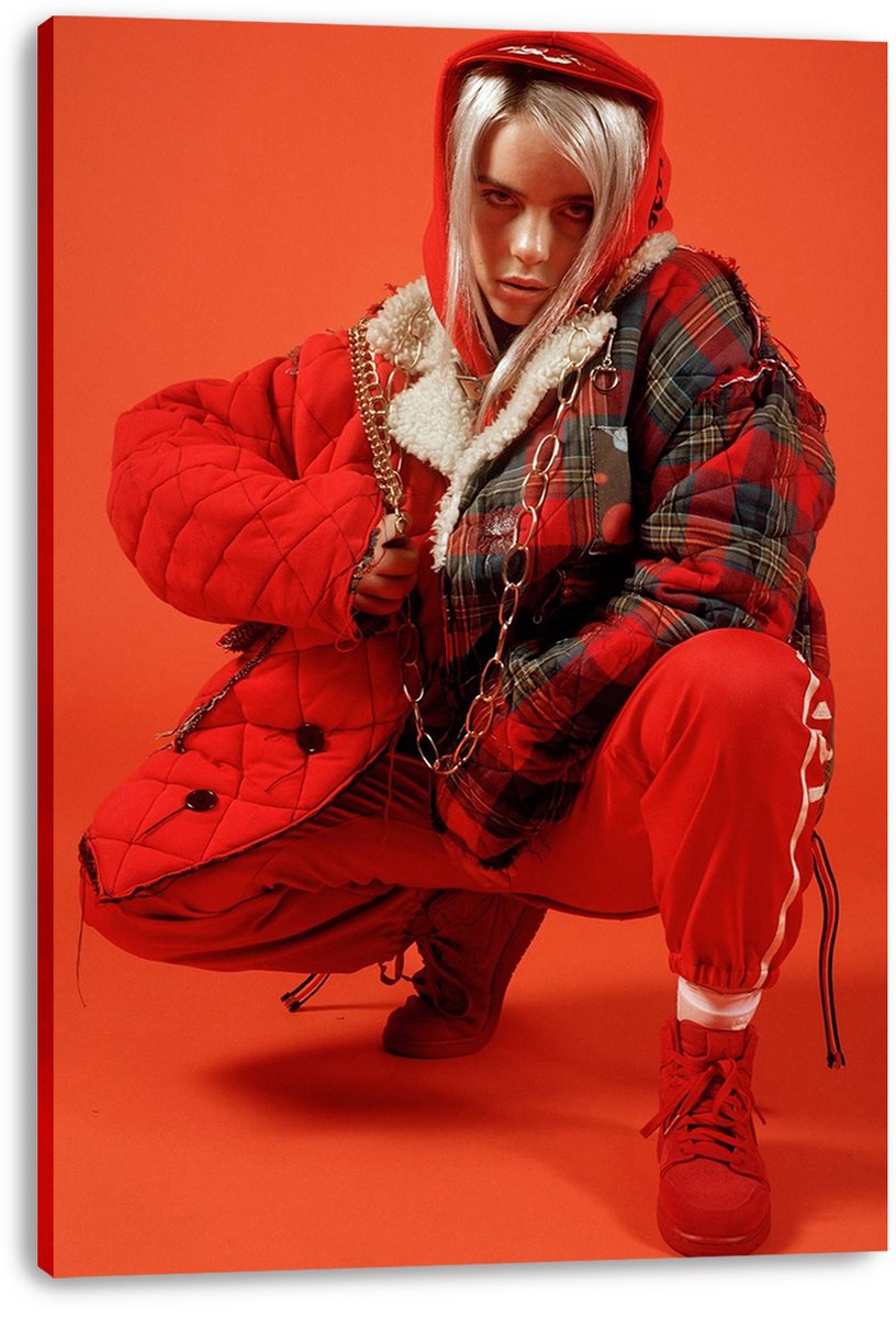 Billie Eilish canvas wall art print presents the singer crouching in red clothing and plaid jacket against a saturated red studio backdrop.