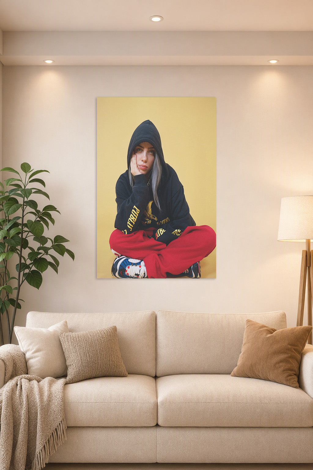 Billie Eilish in a bright living room above a beige sofa.