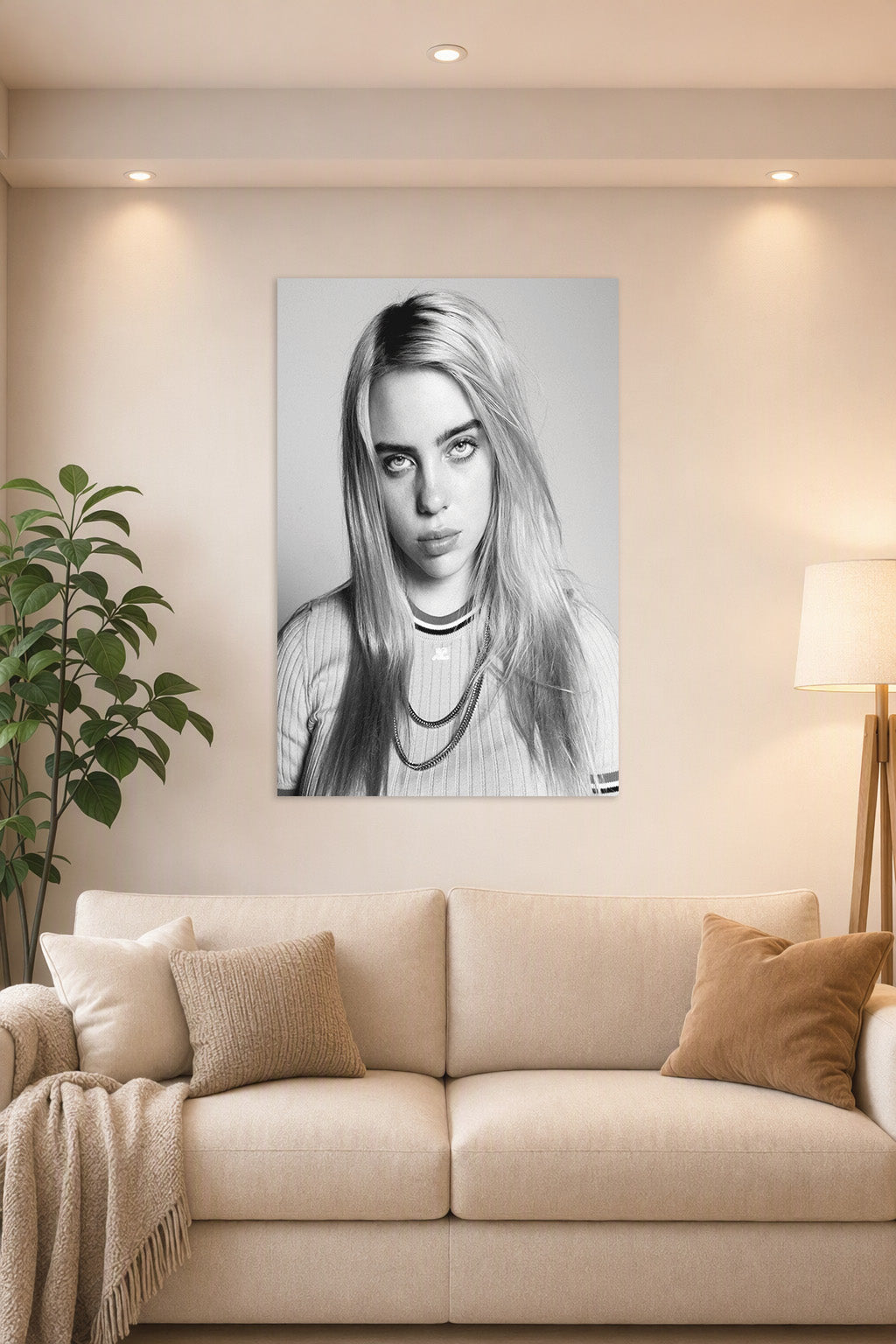 Billie Eilish in a bright living room above a beige sofa.
