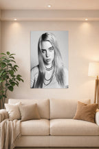 Billie Eilish in a bright living room above a beige sofa.
