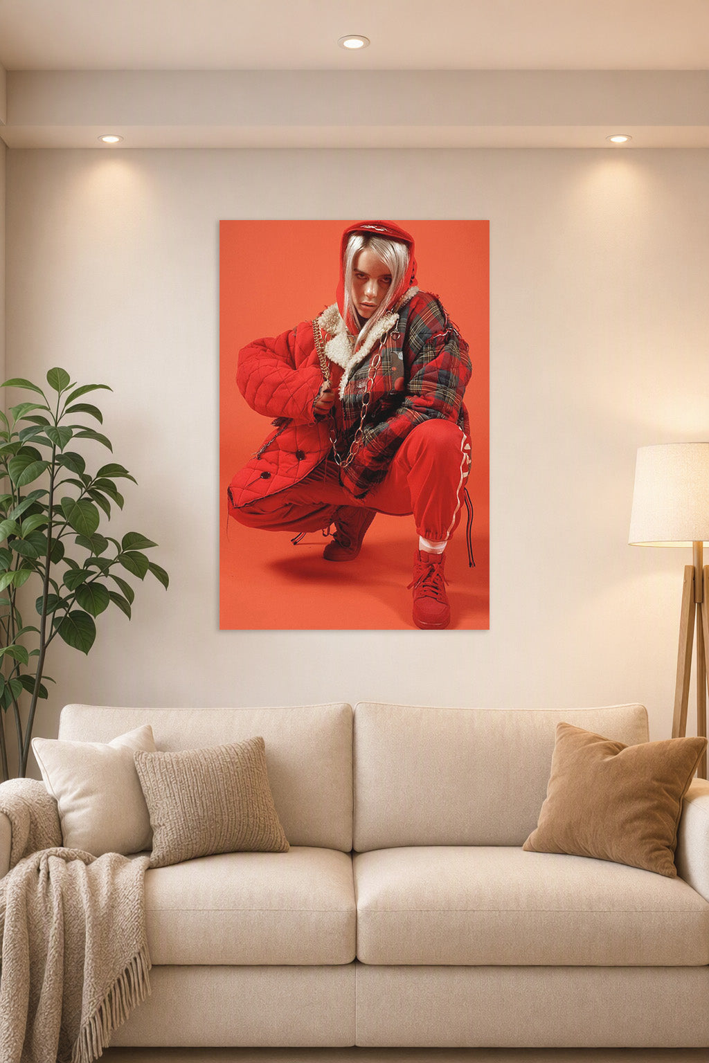 Billie Eilish in a bright living room above a beige sofa.