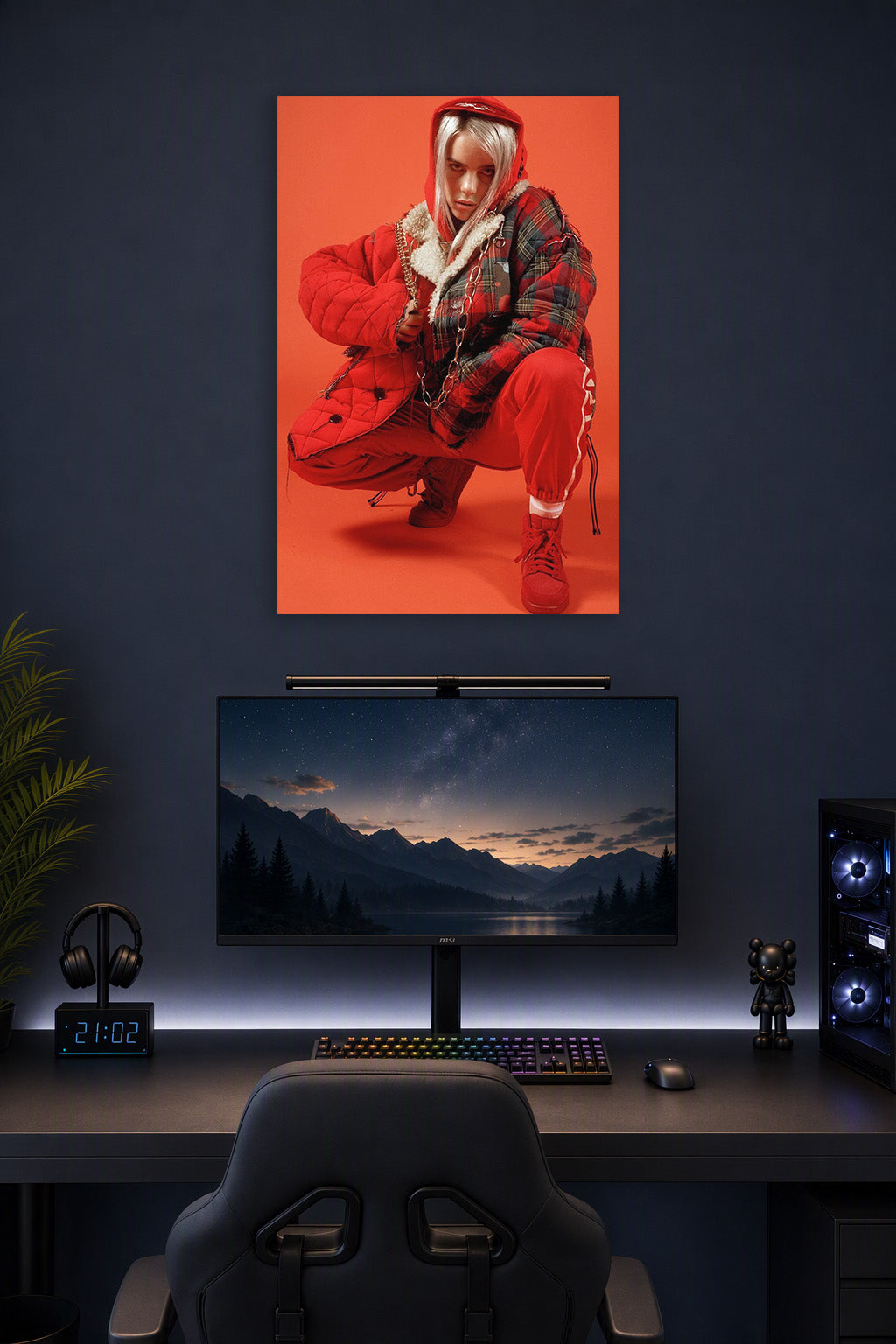 Billie Eilish in a gaming desk setup above a monitor.