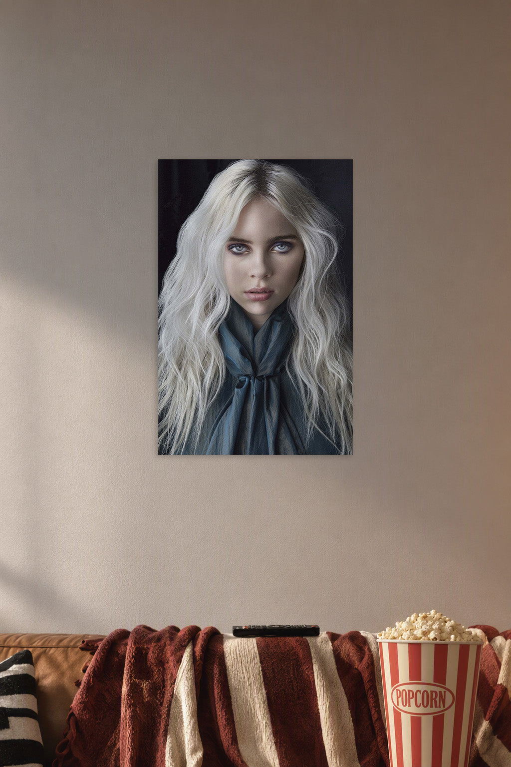 Billie Eilish in a cozy movie room above a brown sofa with popcorn.