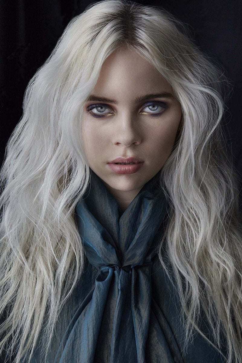 Billie Eilish wall art print featuring a close portrait with platinum-blonde hair, pale blue eyes, and a deep teal scarf.