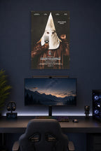 BlacKkKlansman Movie Poster in a gaming desk setup above a monitor.