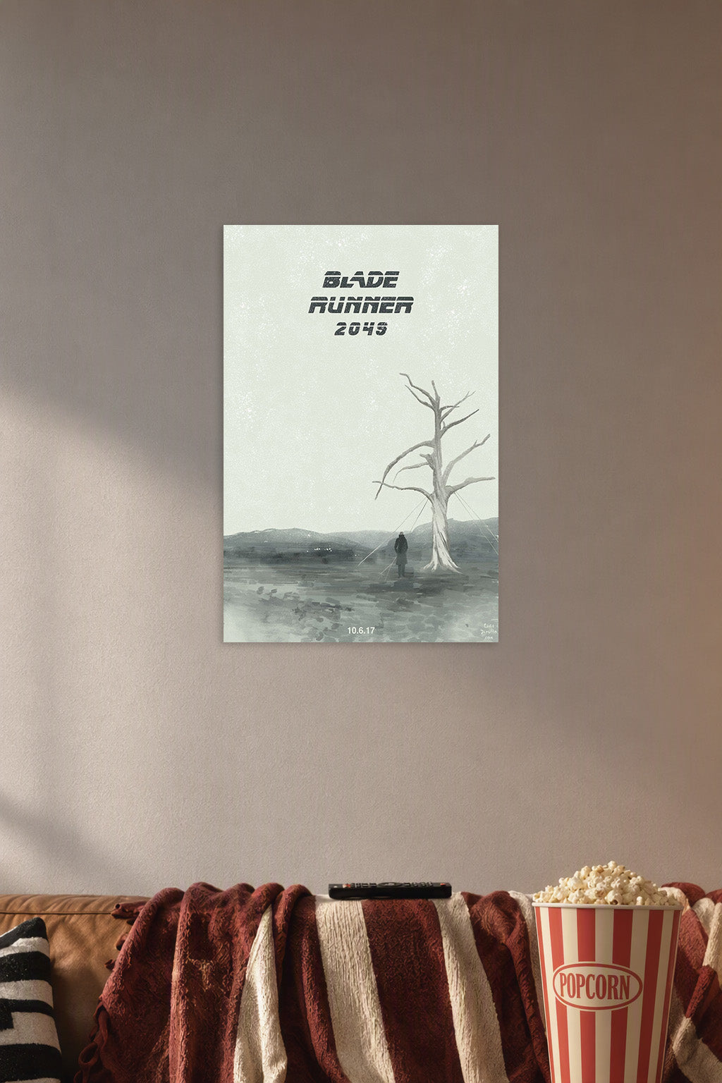 Blade Runner 2049 Minimalist Art in a cozy movie room above a brown sofa with popcorn.