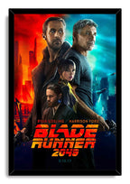 Blade Runner 2049 framed wall art print with four character portraits, futuristic city lights, flying cars, and orange-red title text.