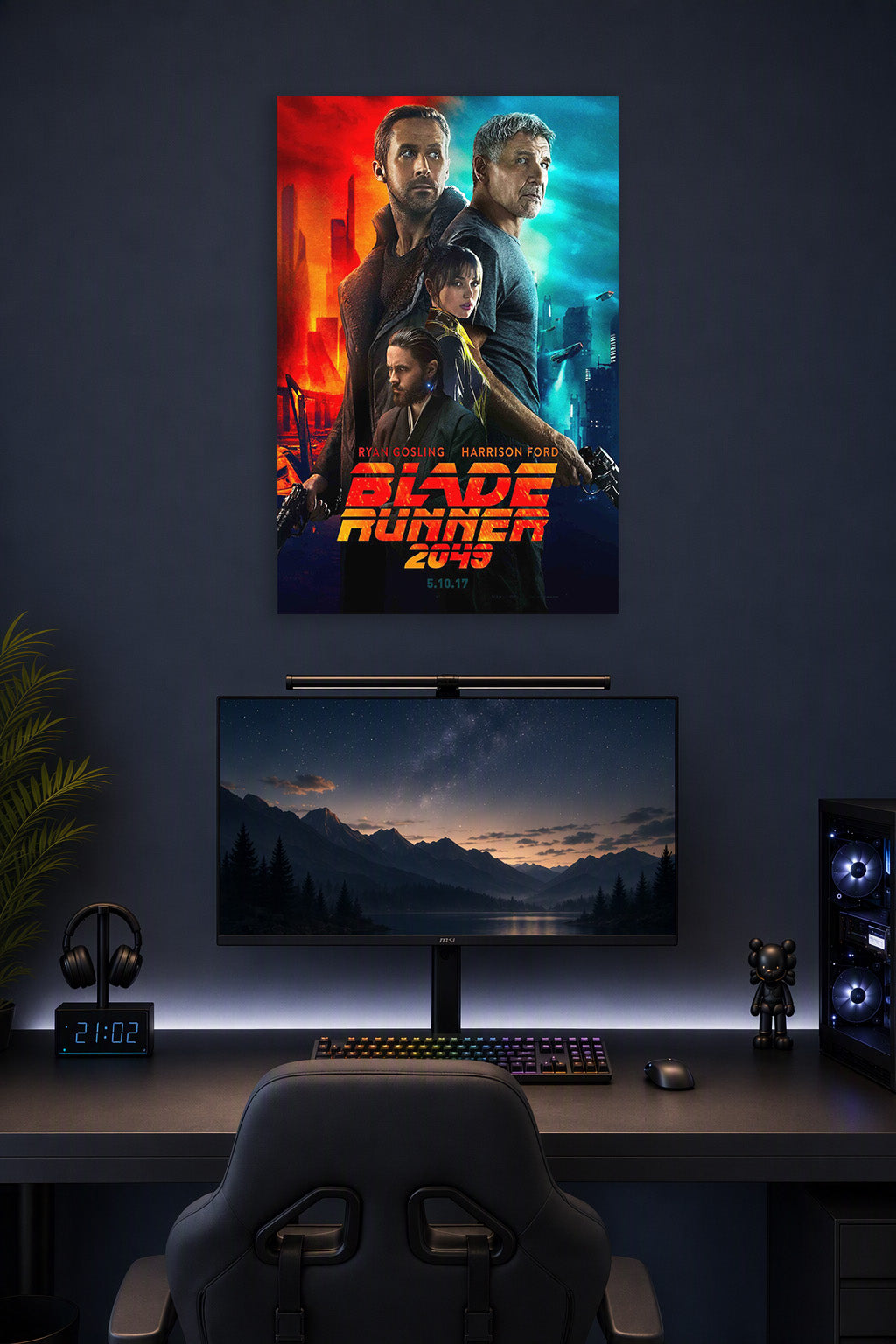 Blade Runner 2049 Movie Poster with Ryan Gosling and Harrison Ford in a gaming desk setup above a monitor.