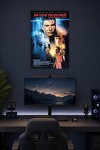 Blade Runner in a gaming desk setup above a monitor.