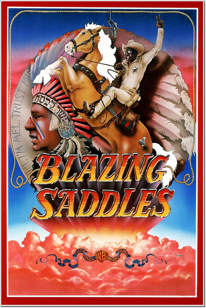 Blazing Saddles poster with a grinning cowboy on a rearing horse, Native American profile, feathered headdress, and red clouds.