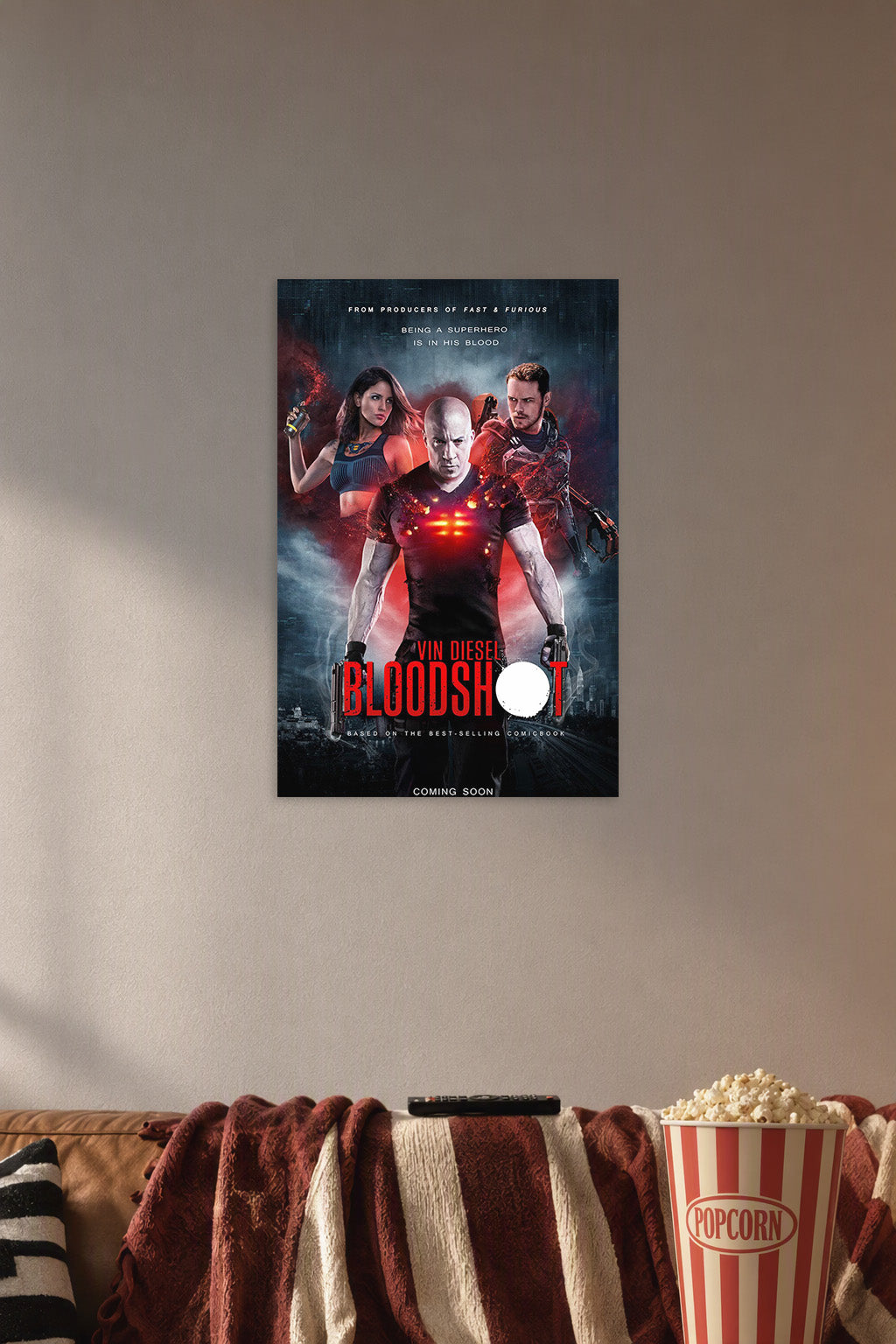 Bloodshot Movie Poster in a cozy movie room above a brown sofa with popcorn.