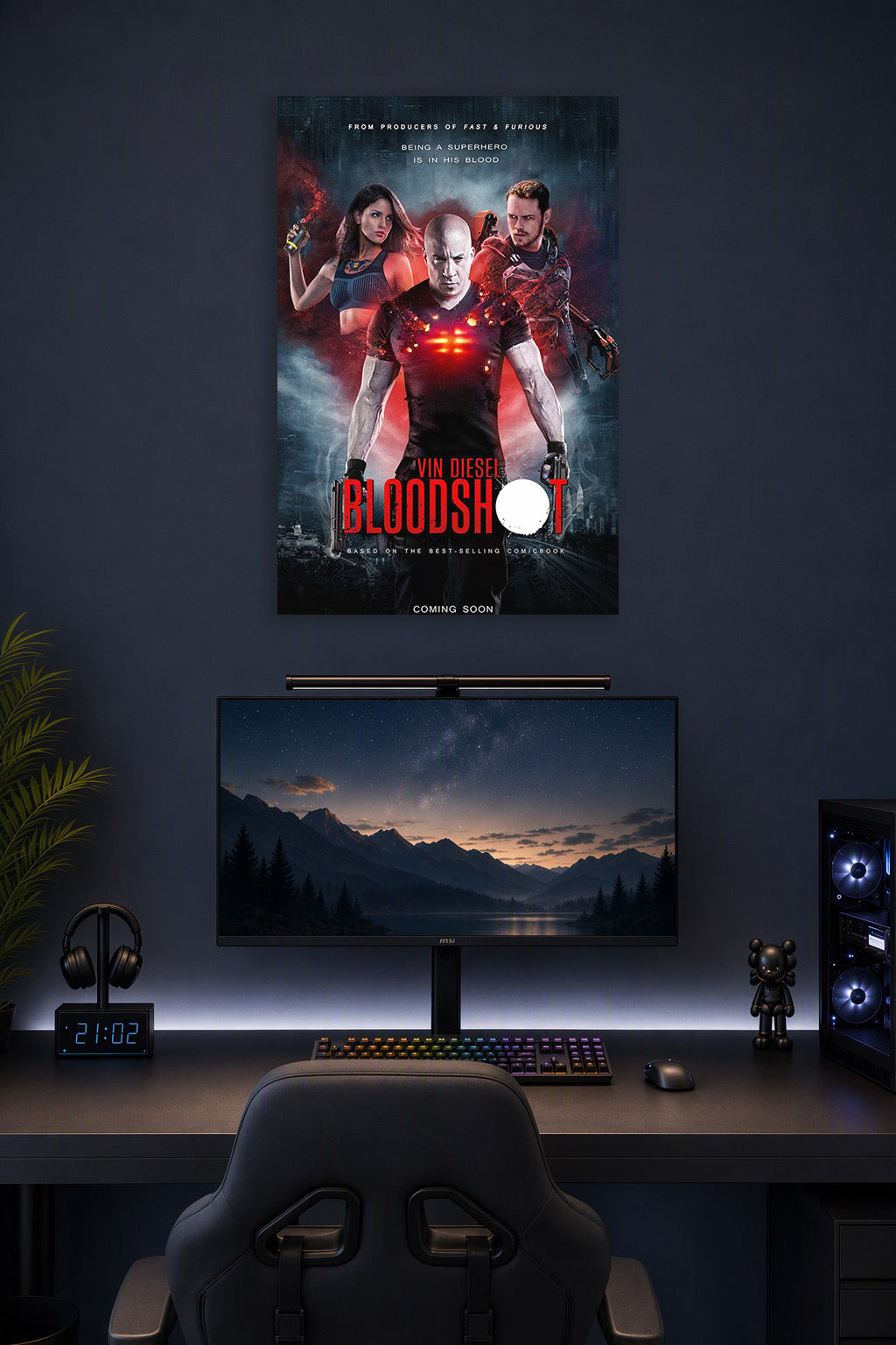 Bloodshot Movie Poster in a gaming desk setup above a monitor.