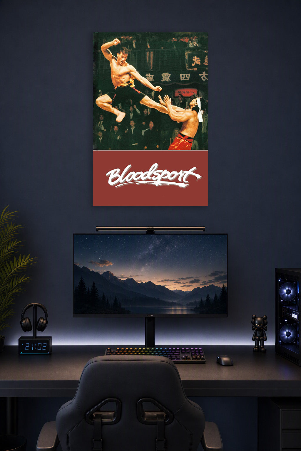 Bloodsport Movie Poster in a gaming desk setup above a monitor.