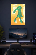 Bold and Brash in a gaming desk setup above a monitor.