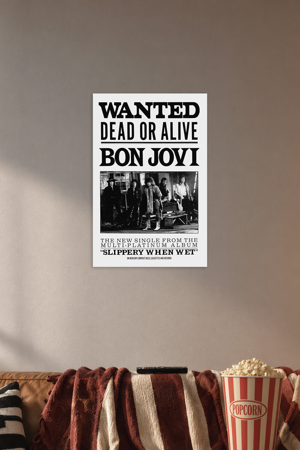 Bon Jovi Band in a cozy movie room above a brown sofa with popcorn.