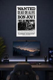 Bon Jovi Band in a gaming desk setup above a monitor.