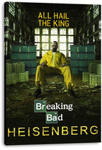 Breaking Bad Heisenberg canvas wall art print depicts Walter White seated in a yellow hazmat suit, framed by cash stacks and barrels.
