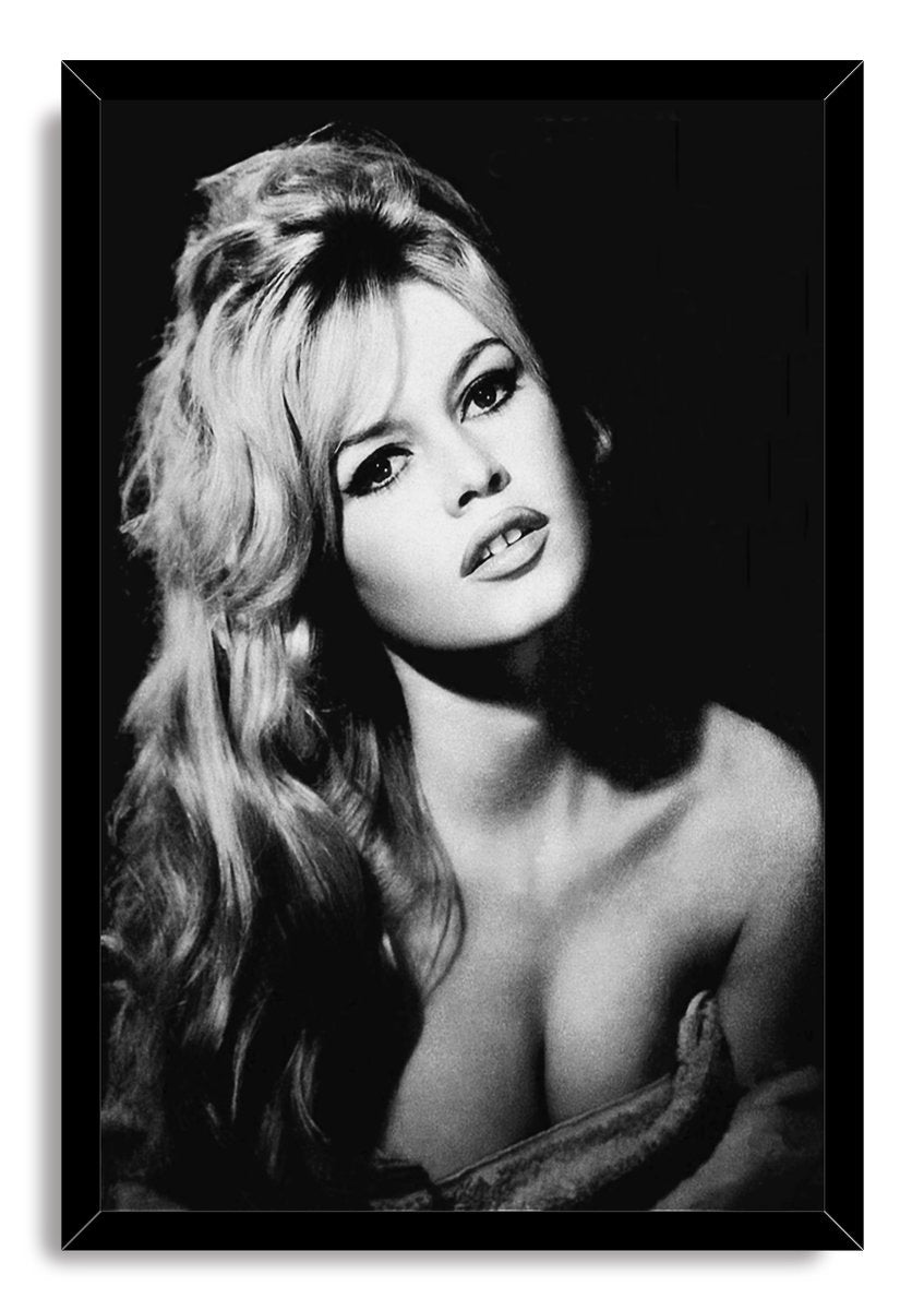 Brigitte Bardot framed wall art print with a black frame around a high-contrast black-and-white portrait of the actress gazing upward.