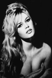 Brigitte Bardot wall art print featuring a black-and-white close-up portrait with long wavy hair, dark eyeliner, and an off-shoulder top.