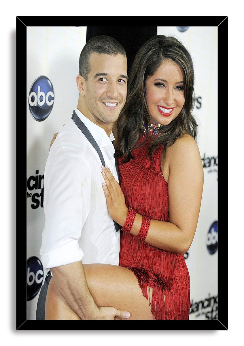 Bristol Palin and Mark Ballas framed wall art print presents their smiling event pose in a black rectangular frame.