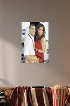 Bristol Palin and Mark Ballas in a cozy movie room above a brown sofa with popcorn.