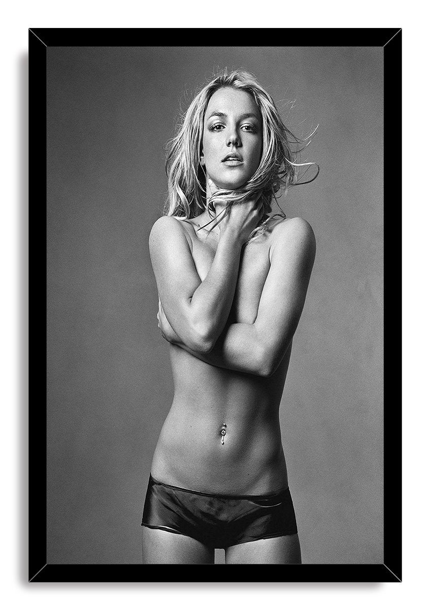 Britney Spears framed wall art print presents a black-and-white full-body portrait in a glossy black rectangular frame.