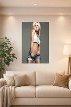 Britney Spears in a bright living room above a beige sofa.