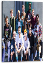 Brockhampton canvas wall art print displaying the group seated and standing together outdoors, wrapped around deep canvas edges.