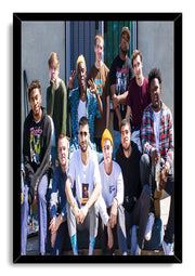 Brockhampton framed wall art print featuring eleven casually dressed members posed outdoors in a sleek black frame.