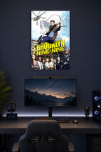 Brooklyn Nine-Nine TV Show in a gaming desk setup above a monitor.