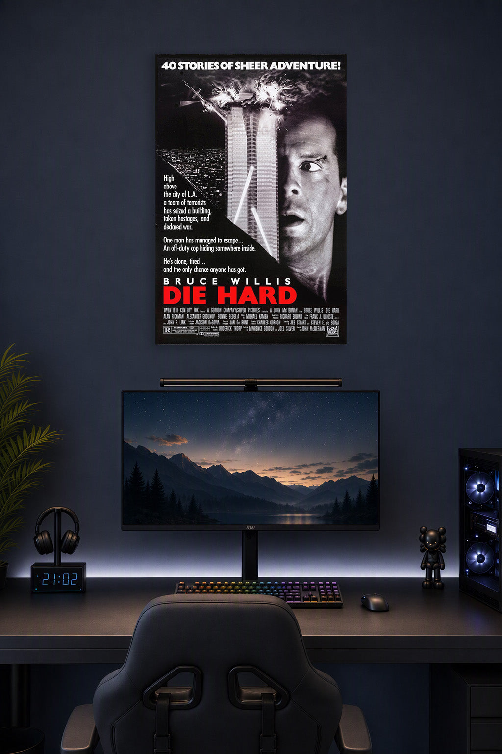 Bruce Willis Die Hard Movie Poster in a gaming desk setup above a monitor.