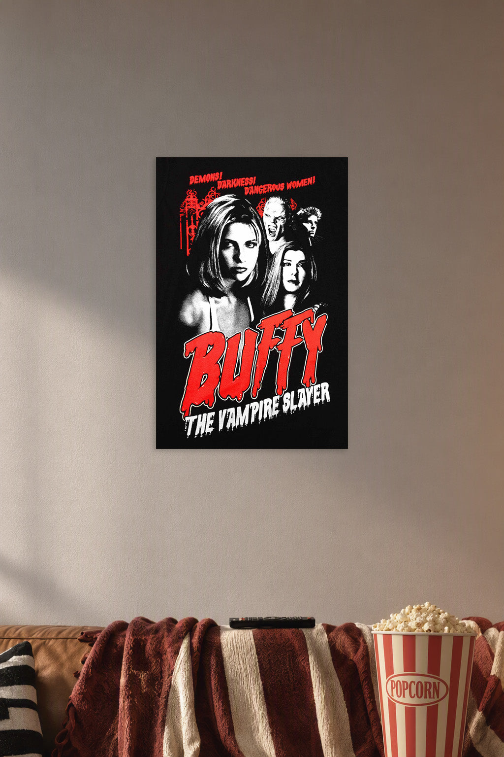 Buffy the Vampire Slayer in a cozy movie room above a brown sofa with popcorn.