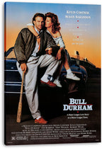 Bull Durham wall art canvas print displays Kevin Costner and Susan Sarandon beside a car with a bat and orange-blue sky.