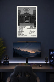 Business Is Business Poster in a gaming desk setup above a monitor.