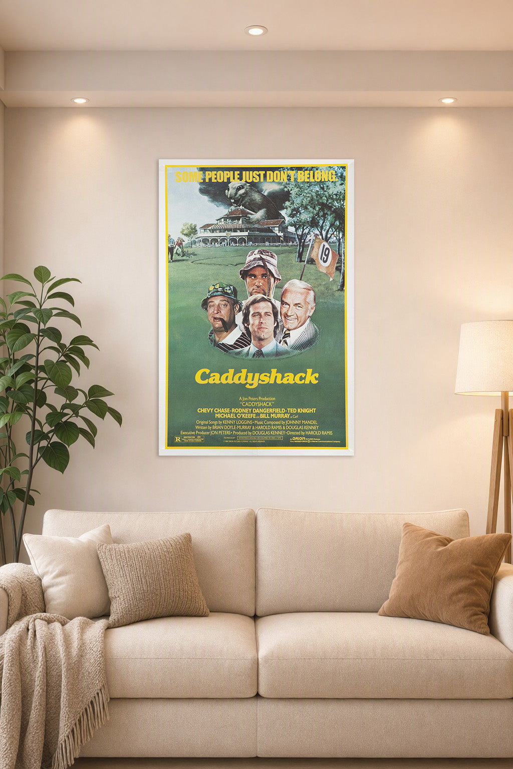 Caddyshack Movie in a bright living room above a beige sofa.