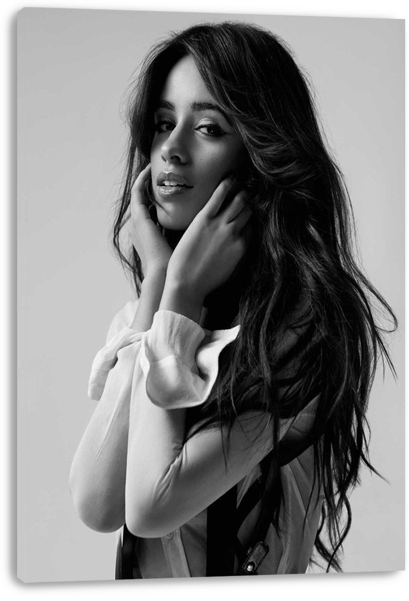 Camila Cabello canvas wall art print presents a grayscale portrait of the singer in a white blouse, mounted with visible wrapped edges.