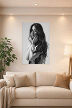 Camila Cabello in a bright living room above a beige sofa.
