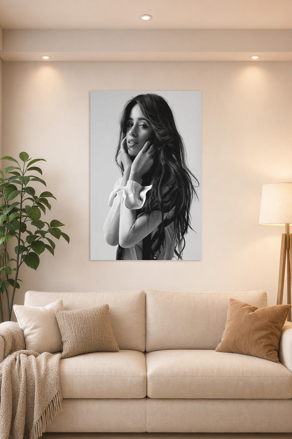 Camila Cabello in a bright living room above a beige sofa.
