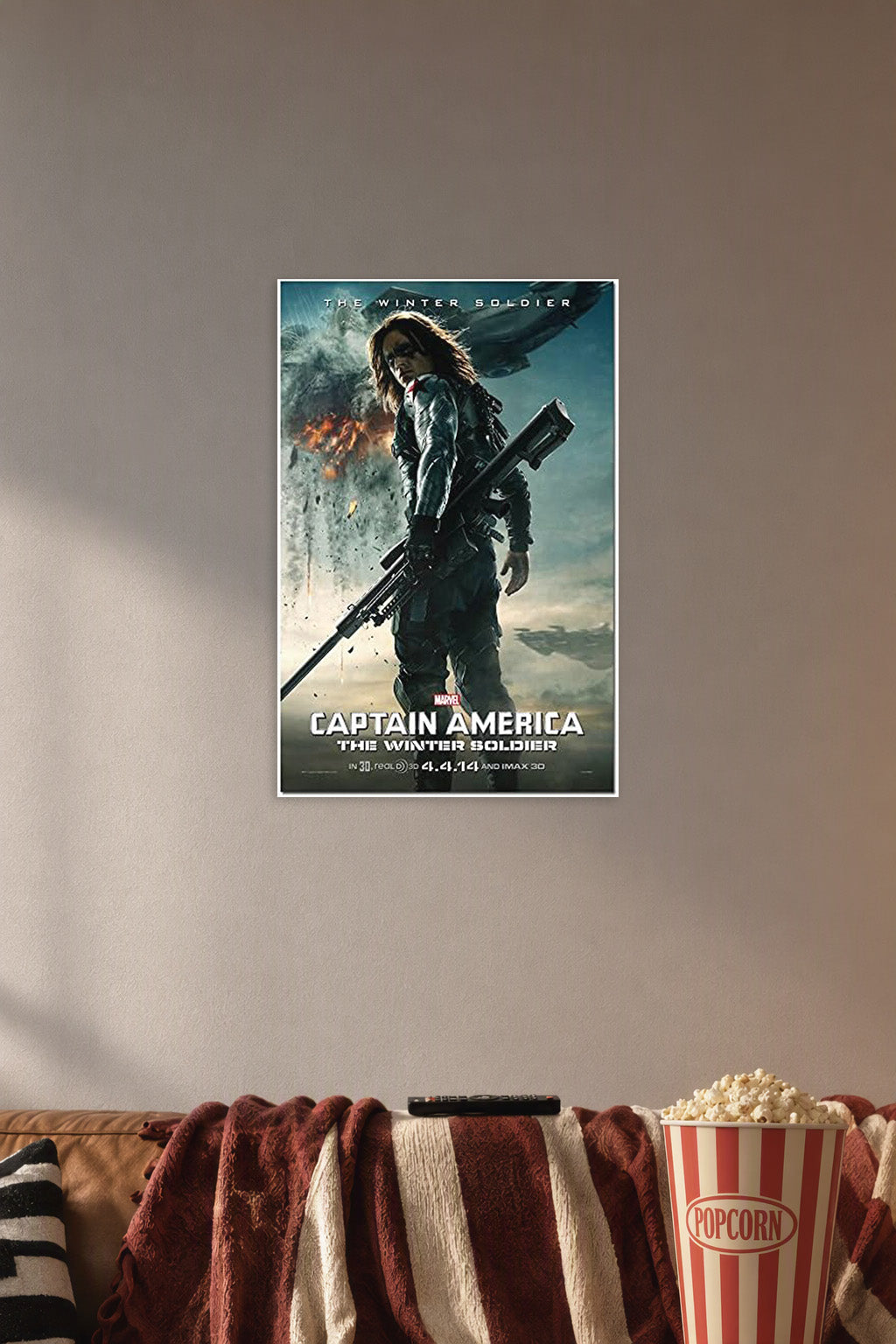 Captain America 2 The Winter Soldier Movie Poster in a cozy movie room above a brown sofa with popcorn.