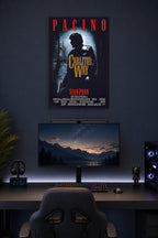 Carlito's Way Al Pacino in a gaming desk setup above a monitor.
