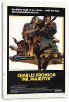 Mr. Majestyk movie poster canvas print featuring Charles Bronson with a rifle amid armed men, a woman, vehicles, and fiery action.