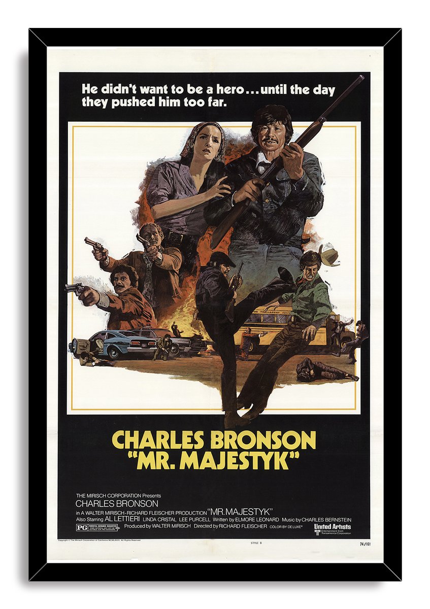 Framed Mr. Majestyk movie poster wall art print with Charles Bronson wielding a rifle over an illustrated action scene and bold yellow title.