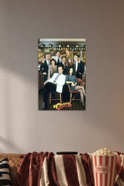 Cheers TV Show Cast in a cozy movie room above a brown sofa with popcorn.