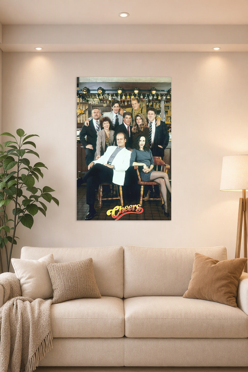 Cheers TV Show Cast in a bright living room above a beige sofa.