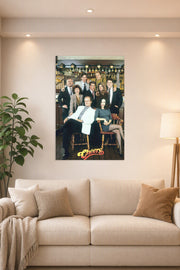 Cheers TV Show Cast in a bright living room above a beige sofa.