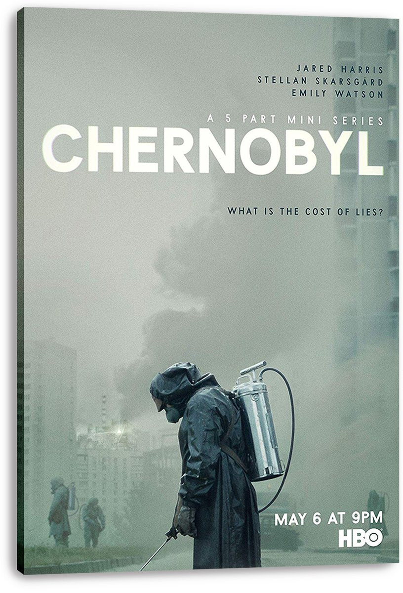 Chernobyl canvas wall art print displays a protective-suited worker carrying a sprayer beneath bold white series lettering.